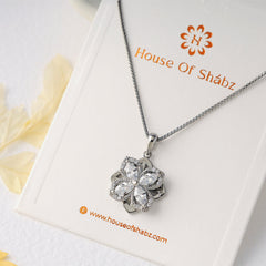 Kristin Rotating Flower Pendant- Silver